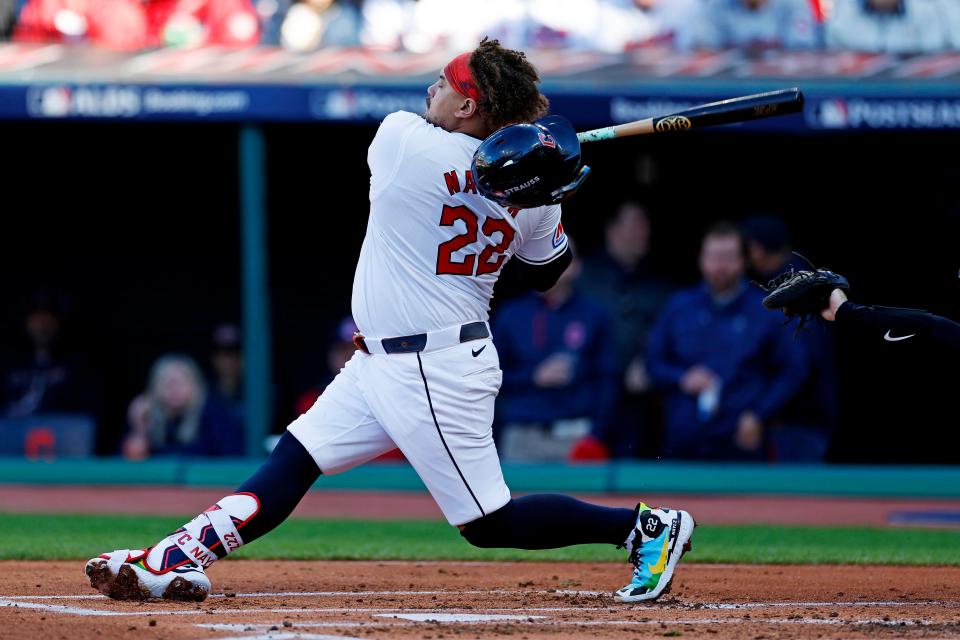 Guardians first base Josh Naylor swings at a pitch during the second inning against the Tigers in Game 2 of the ALDS, Oct. 7, 2024, in Cleveland.