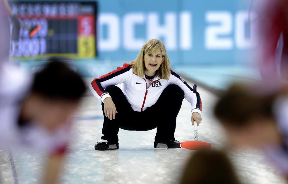 Erika Brown, skip for the United States, shouts instructions to her teammates during the women's curling competition againt Russia at the 2014 Winter Olympics, Tuesday, Feb. 11, 2014, in Sochi, Russia. (AP Photo/Wong Maye-E)