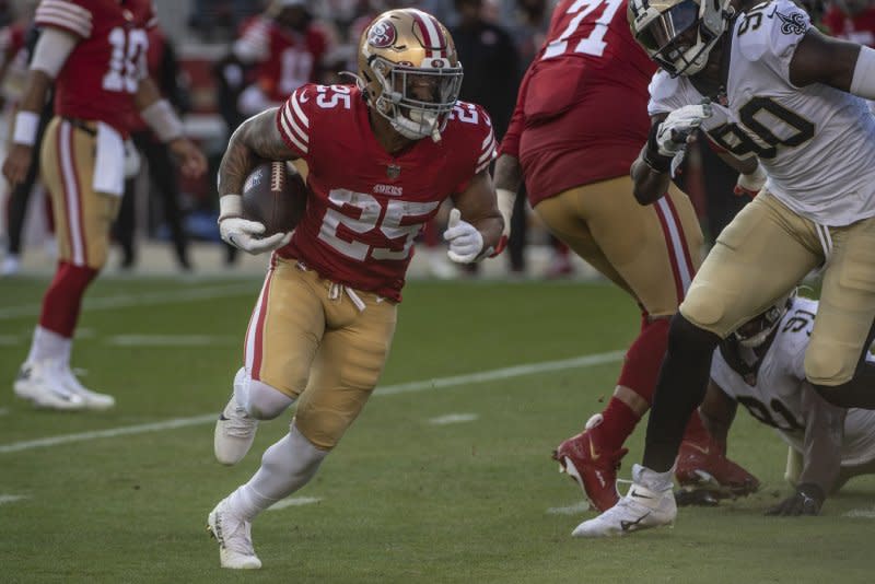 San Francisco 49ers running back Elijah Mitchell (L) would likely share the backfield workload with Elijah Mitchell if Christian McCaffrey misses time. File Photo by Terry Schmitt/UPI