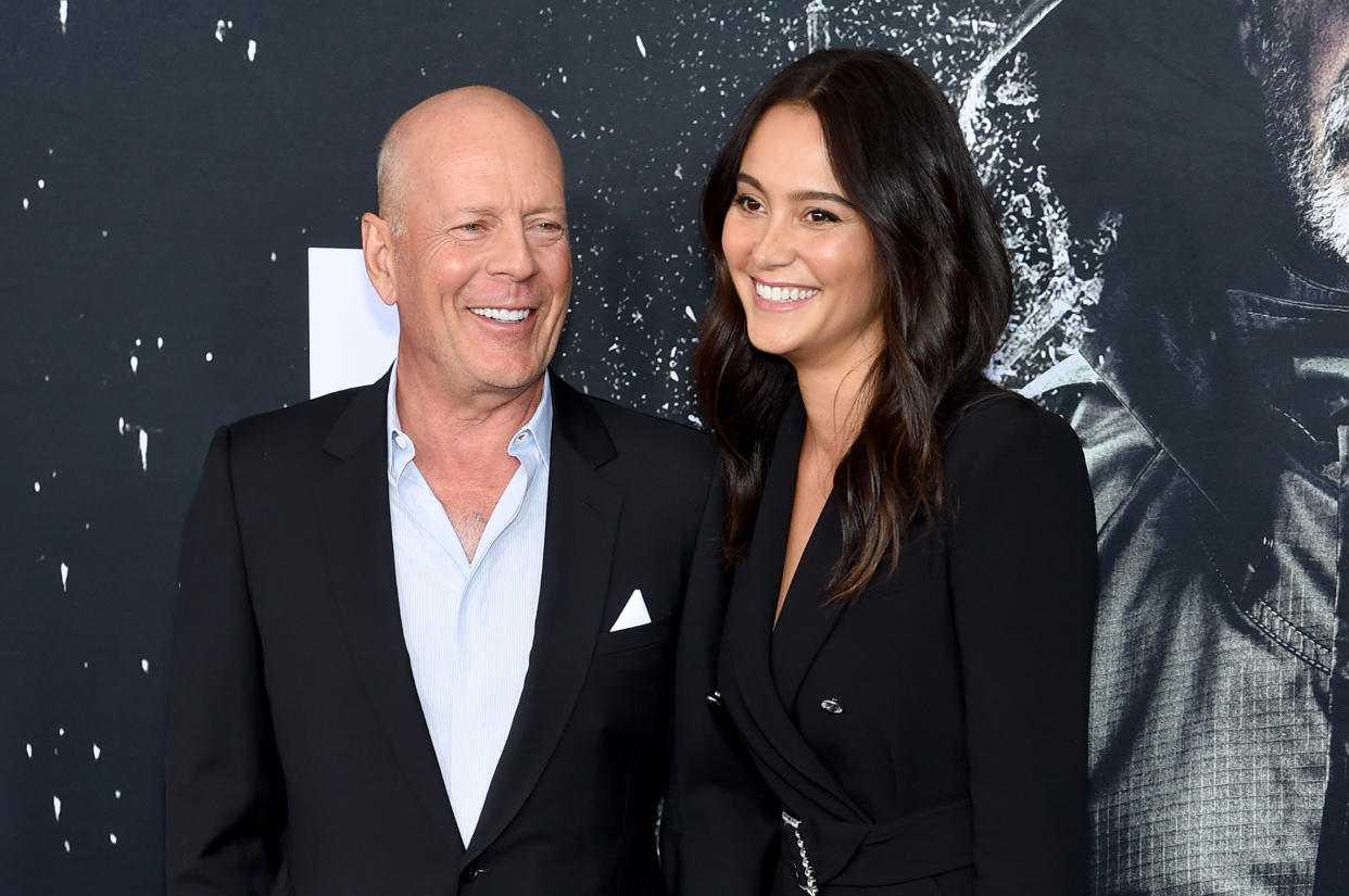 Actor Bruce Willis and his wife Emma Heming Willis shared an affectionate moment. (Photo: Jamie McCarthy/Getty Images)