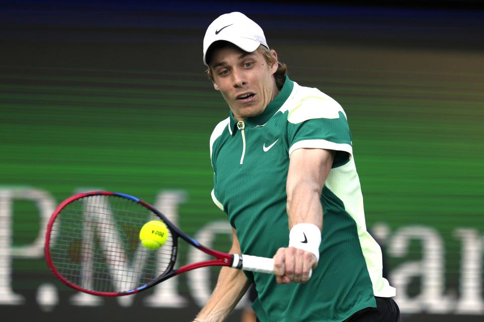 Denis Shapovalov of Canada returns the ball to Andy Murray of Great Britain during a match of the Dubai Duty Free Tennis Championships in Dubai, United Arab Emirates, Monday, Feb. 26, 2024. (AP Photo/Kamran Jebreili)