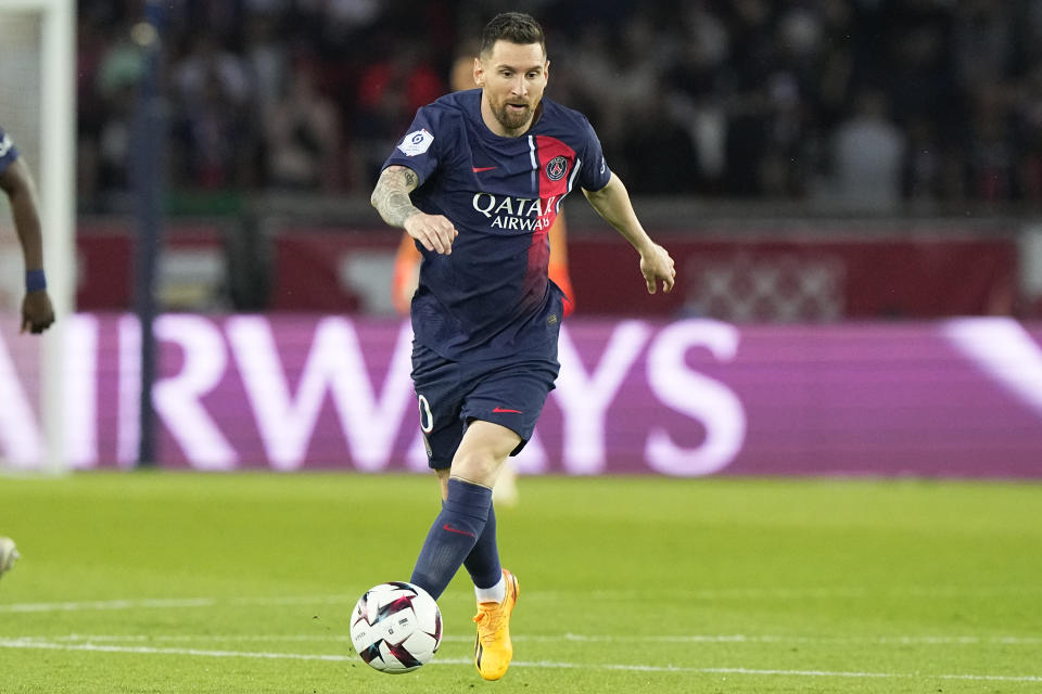 PSG's Lionel Messi is in action during the French League One soccer match between Paris Saint-Germain and Clermont at the Parc des Princes in Paris, France, Saturday, June 3, 2023. (AP Photo/Michel Euler)