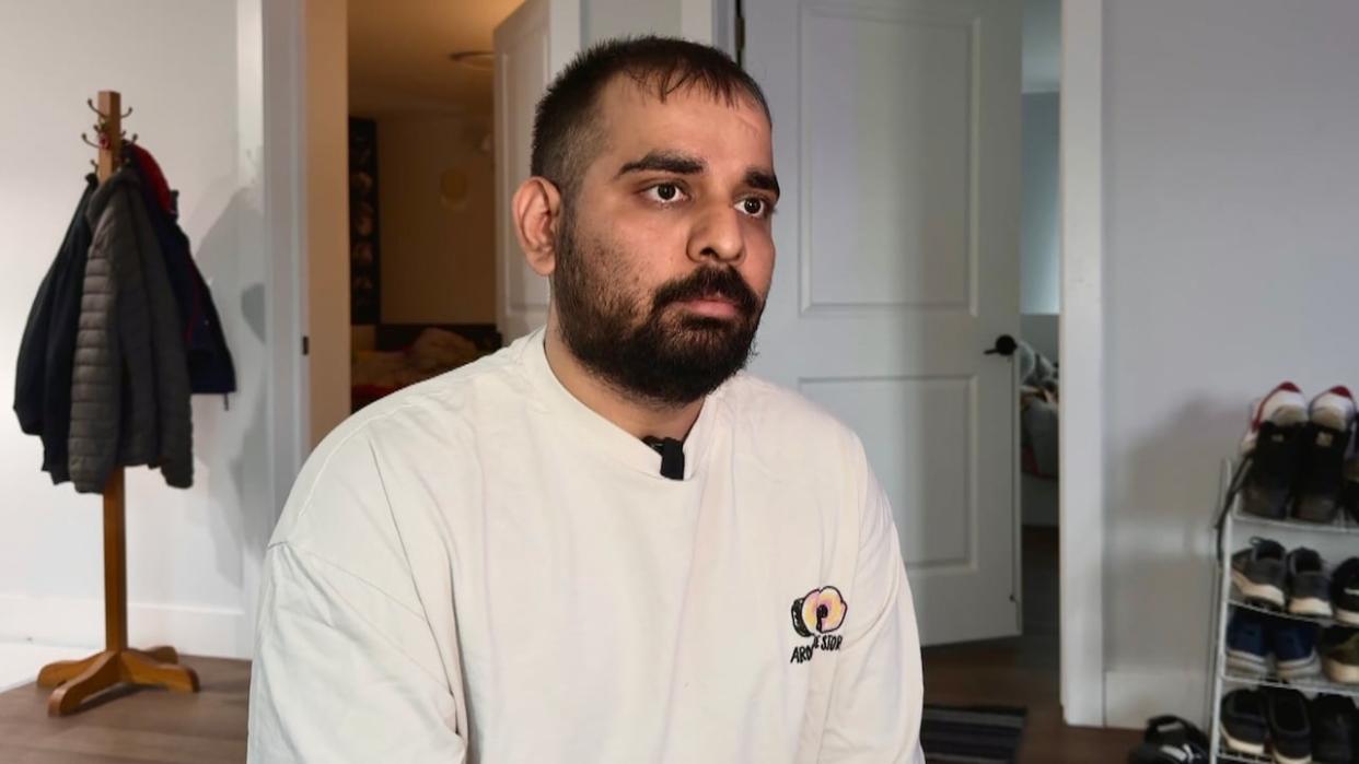 Maninder Singh is shown at his apartment in Halifax. He says students who are commuting are paying up to $100 round-trip from Halifax to Sydney. (Craig Paisley/CBC - image credit)