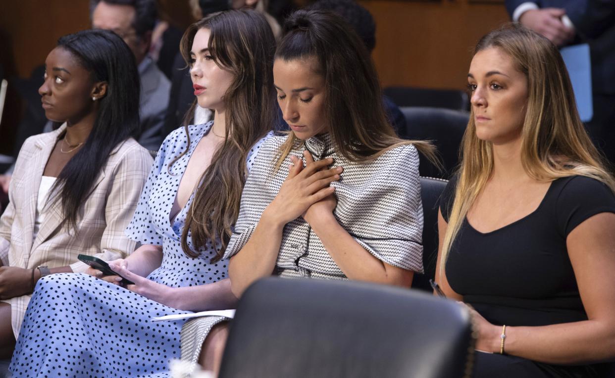 U.S. gymnasts (from left) Simone Biles, McKayla Maroney, Aly Raisman and Maggie Nichols, appear during a Senate Judiciary hearing in September.