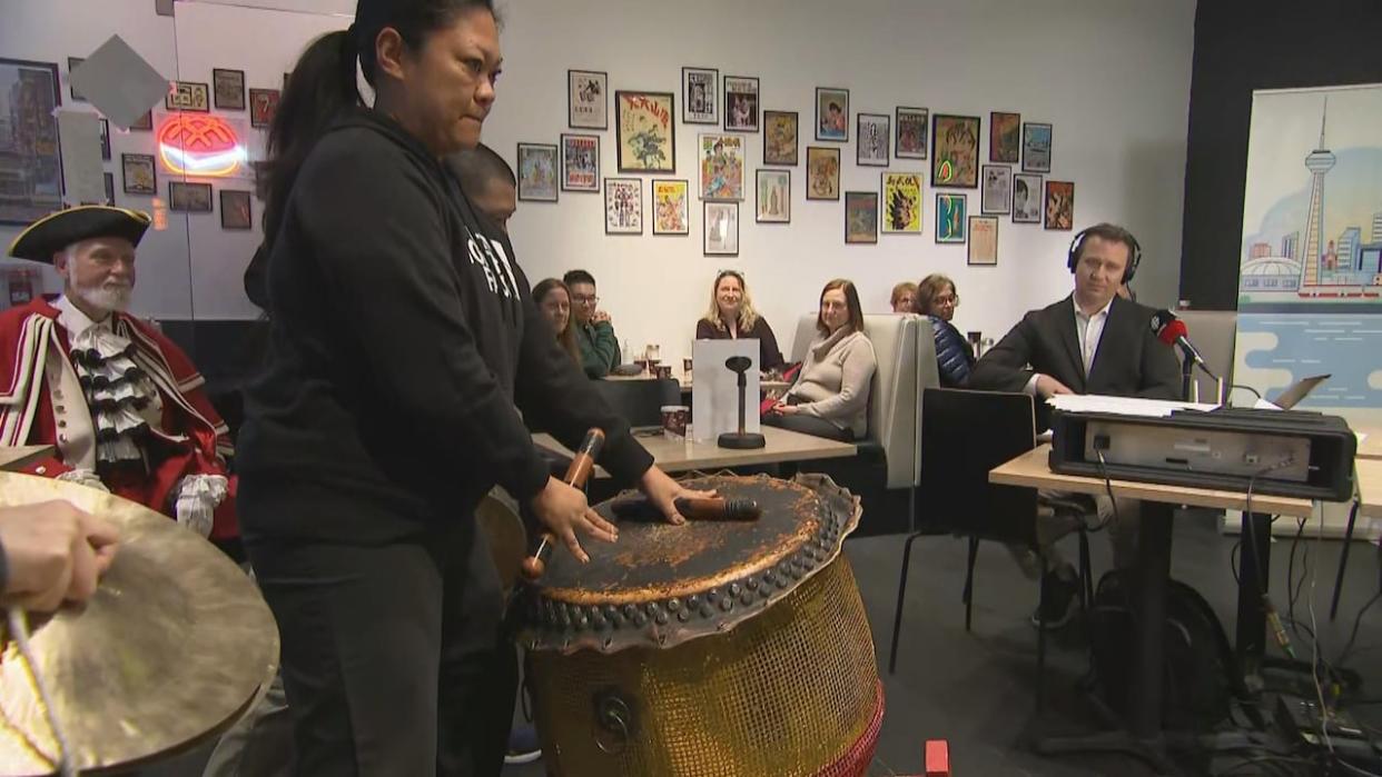 CBC Radio's Metro Morning was live from a popular cafe in Markham on Thursday. The show included a percussion performance ahead of the Lunar New Year. (CBC - image credit)