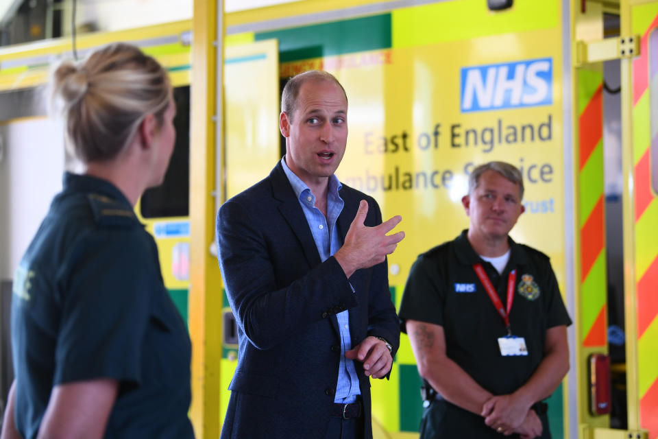 The Duke of Cambridge talking to paramedics from the East of England Ambulance Service Trust during a visit to the Ambulance Station in King's Lynn, Norfolk.