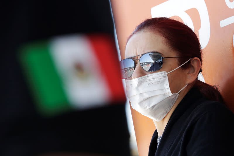 A woman wears a face mask to protect from the coronavirus disease (COVID-19) at Abraham Gonzalez International Airport, in Ciudad Juarez