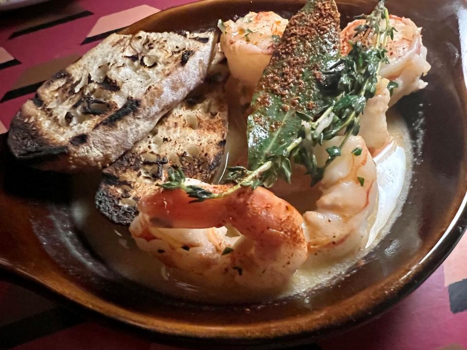 The Gambas al Ajillo -- Argentinian red shrimp, sherry garlic butter sauce and grilled sourdough -- at The Iberian Pig in the Gulch in Nashville on Oct. 23, 2023