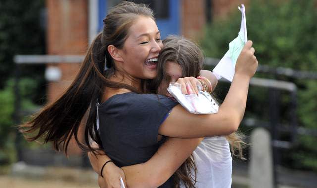 Mike McCarthy joins three students in Blackburn as they find out their A-Level results live on Sunrise.