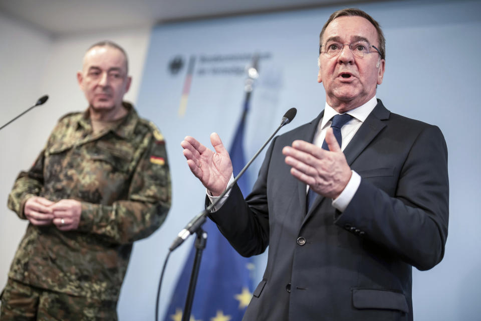 German Defense Minister Boris Pistorius, right, speaks during a press conference on the decision on the future structure of the Bundeswehr, the German military, in Berlin, Thursday, April 4, 2024. Germany's defense minister on Thursday announced plans to streamline and reorganize the country's military command as part of efforts to make the armed forces of NATO's most populous European member “war-capable.” At left is Carsten Breuer, Inspector General of the Bundeswehr. (Michael Kappeler/dpa via AP)