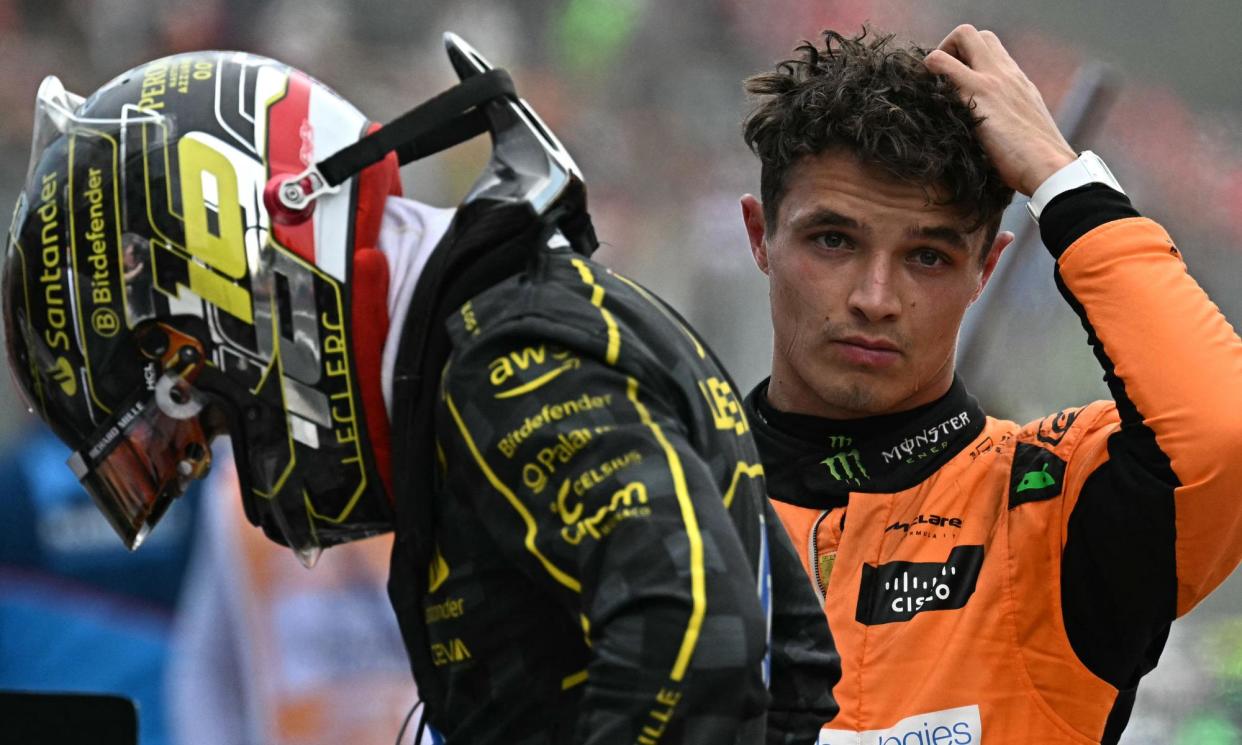 <span>Lando Norris (right) finished third behind Charles Leclerc (left) at Monza as McLaren did not ask Oscar Piastri to give up second place.</span><span>Photograph: Gabriel Bouys/AFP/Getty Images</span>