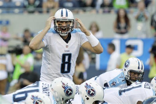 Tennessee Titans quarterback Matt Hasselbeck yells to his team in the first half of an NFL football preseason game against the Seattle Seahawks, Saturday, Aug. 11, 2012, in Seattle. (AP Photo/Rick Bowmer)