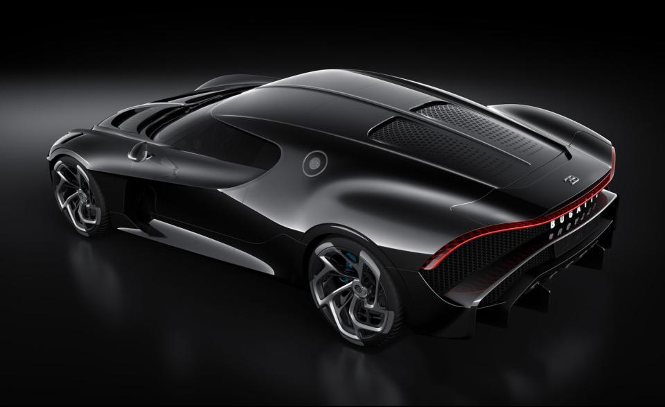 <p>A perforated panel covers the engine, which is exposed on the Chiron and the Divo. As on the Chiron, the taillight is one giant LED strip that extends across the length of the rear, but on La Voiture Noire it follows the curvature of the rear end that is created by the rear haunches and deck.</p>