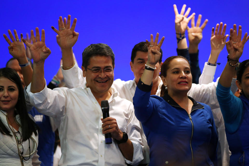 <p>Honduras President and National Party candidate Juan Orlando Hernandez celebrates with supporters and his wife Ana Garcia de Hernandez after the first official presidential election results were released in Tegucigalpa, Honduras, Nov. 27, 2017. (Photo: Edgard Garrido/Reuters) </p>