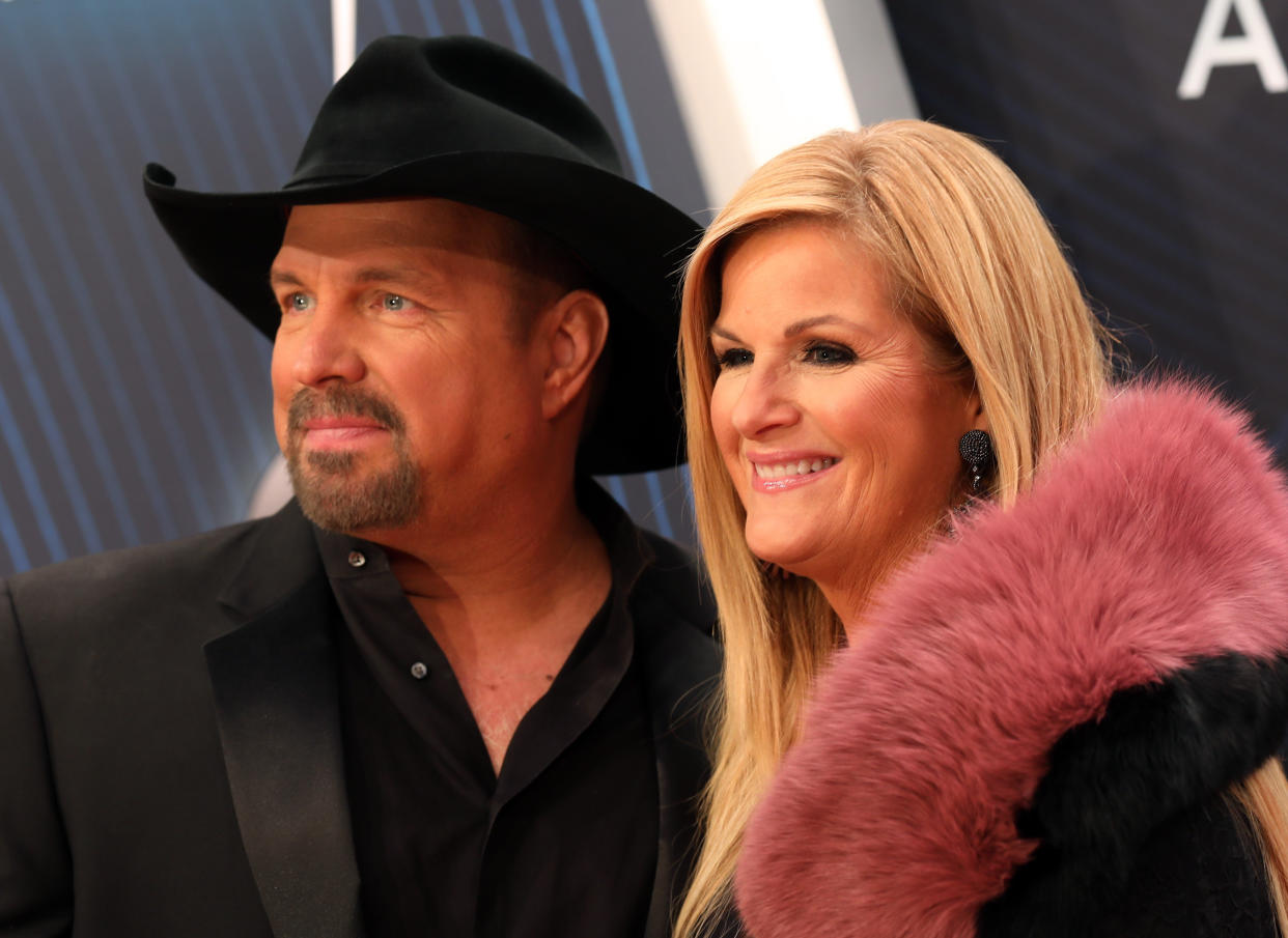 Garth Brooks and Trisha Yearwood arrive&nbsp;Wednesday at the Country Music Association Awards in Nashville. (Photo: Jamie Gilliam / Reuters)