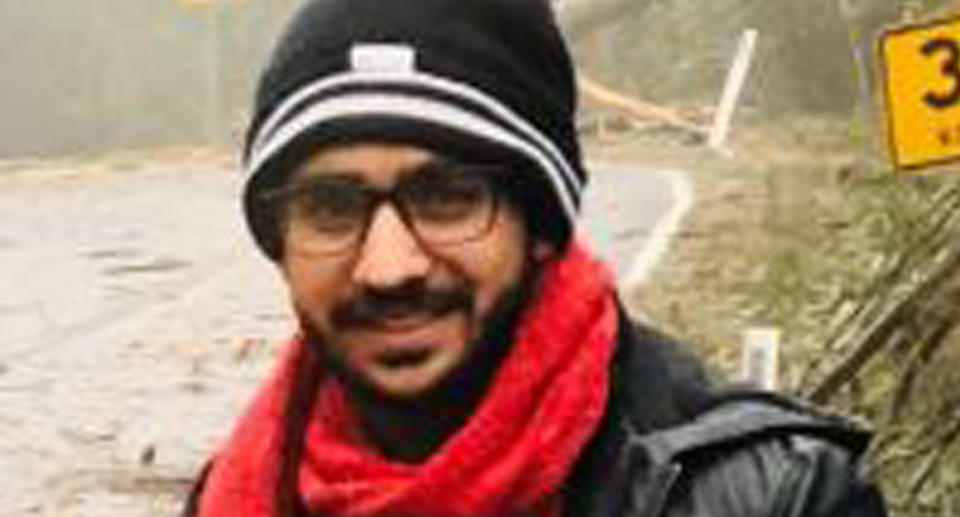 Pictured is Poshik Sharma in a beanie.