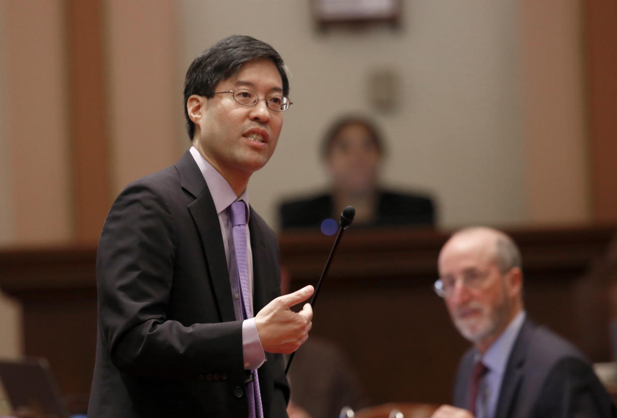 FILE - In this Wednesday, Sept. 4, 2019 file photo, state Sen. Richard Pan, D-Sacramento, speaks on a bill before lawmakers in Sacramento, Calif. On Thursday, April 14, 2022, Pan announced he is withdrawing his bill that would have stopped parents from getting exemptions for their child based on personal beliefs. (AP Photo/Rich Pedroncelli, File)