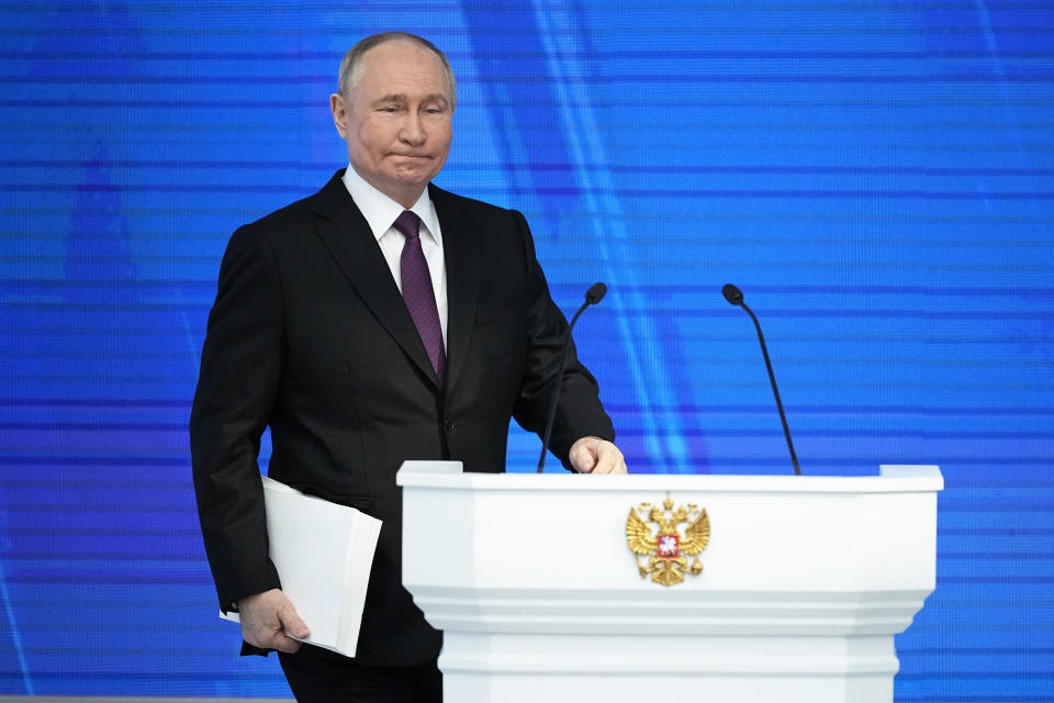 Russian President Vladimir Putin enters a hall to deliver his state-of-the-nation address in Moscow, Russia, Thursday, Feb. 29, 2024. (AP Photo/Alexander Zemlianichenko)