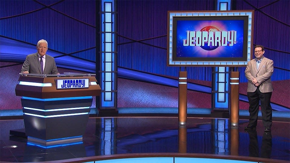 "Jeopardy!" host Alex Trebek and socially distant four-day champ Kevin Walsh.