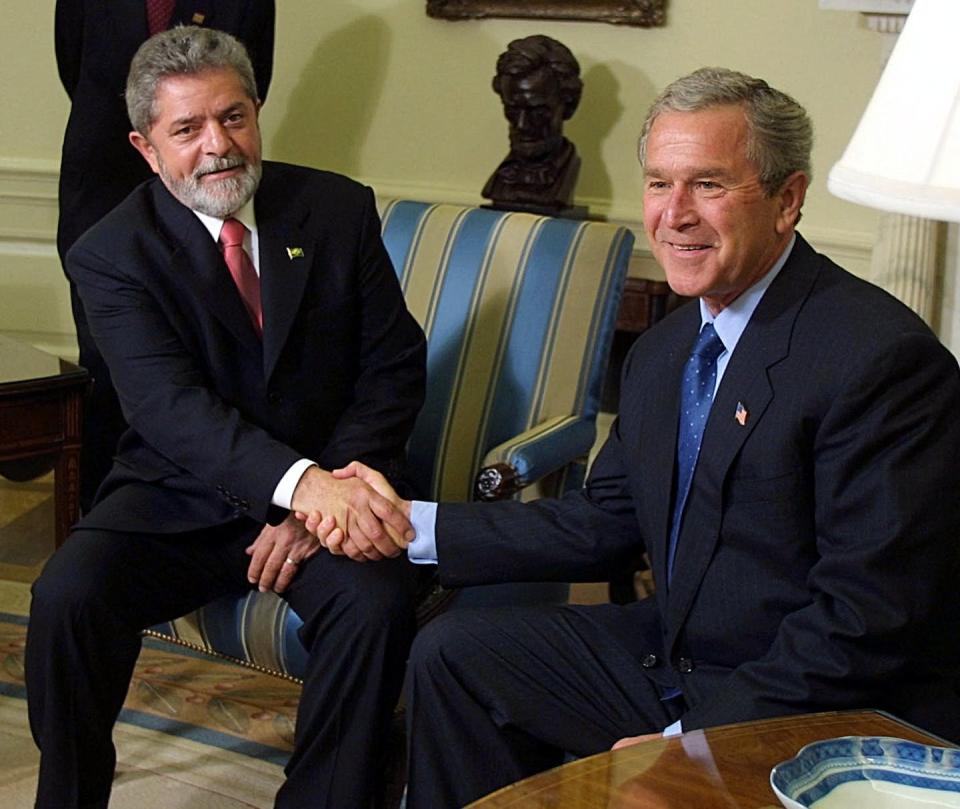 Brazilian President Luiz Inacio Lula da Silva with U.S. President George W. Bush in 2003. <a href="https://www.gettyimages.com/detail/news-photo/brazilian-president-luiz-inacio-lula-da-silva-is-welcomed-news-photo/1243423329?adppopup=true" rel="nofollow noopener" target="_blank" data-ylk="slk:Manny Ceneta/AFP via Getty Images;elm:context_link;itc:0;sec:content-canvas" class="link ">Manny Ceneta/AFP via Getty Images</a>