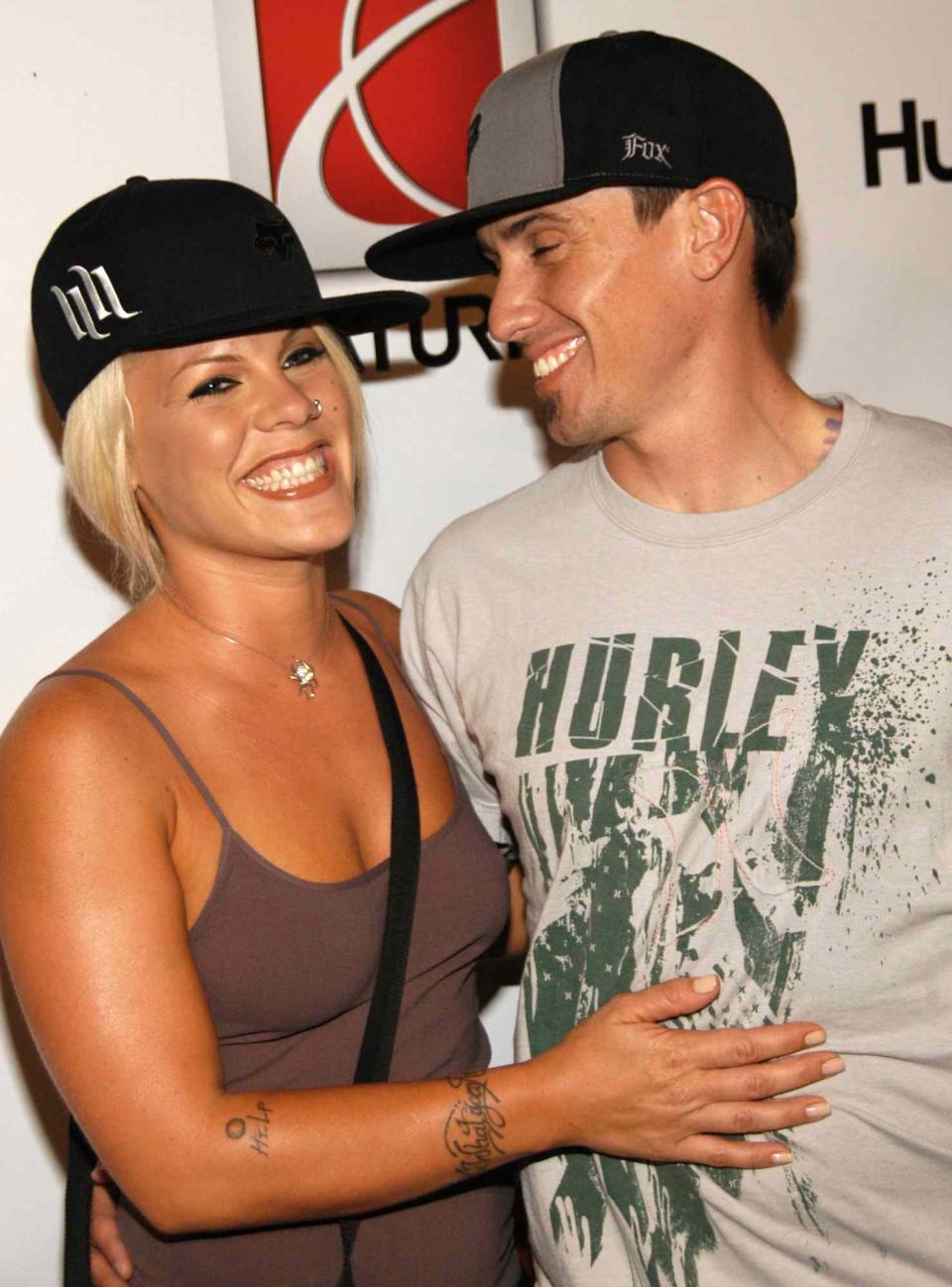 Pink and Carey Hart attend ; Saturn Kicks Off X-Games 12 with Fashion Show Celebrating Saturn's VUE Green Line Hybrid at Hollywood Boulevard on August 2, 2006