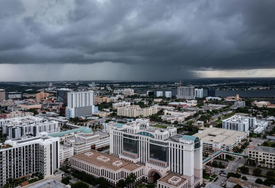 A storm moves toward downtown West Palm Beach, Florida on September 27, 2023. Since Sunday, 5.77 inches of rain have fallen in the city. 