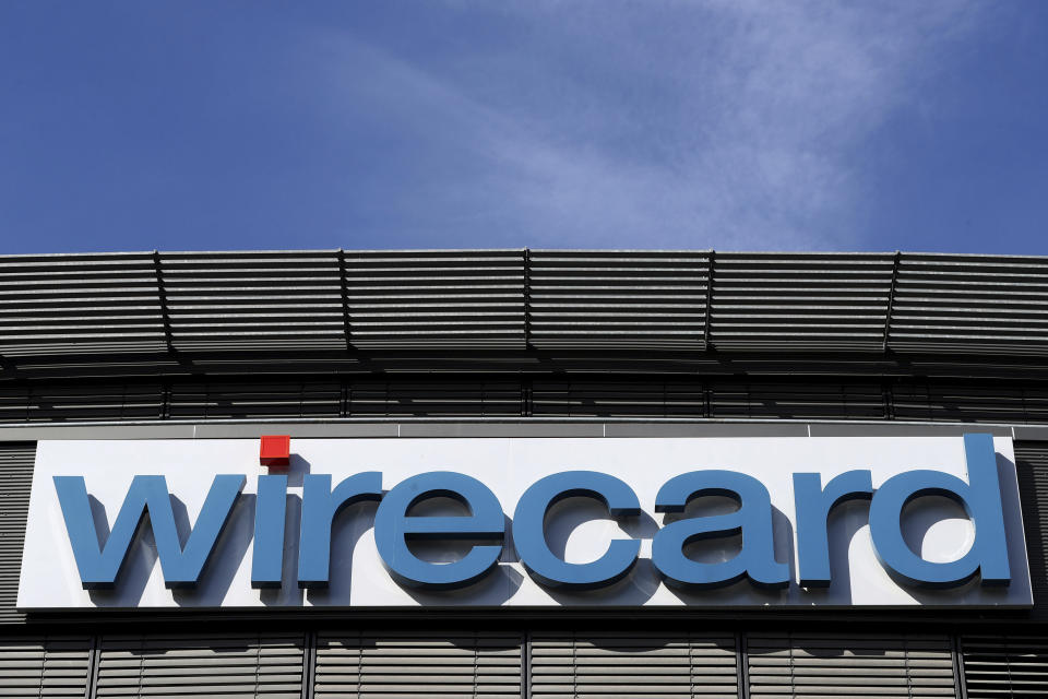 FILE - In this  Thursday, April 25, 2019 file photo the logo of financial services company wirecard is pictured at the headquarters in Munich, Germany. Shares in German payment service provider Wirecard AG plunged Thursday as the company announced it was postponing its delayed annual report yet again. (AP Photo/Matthias Schrader, file)