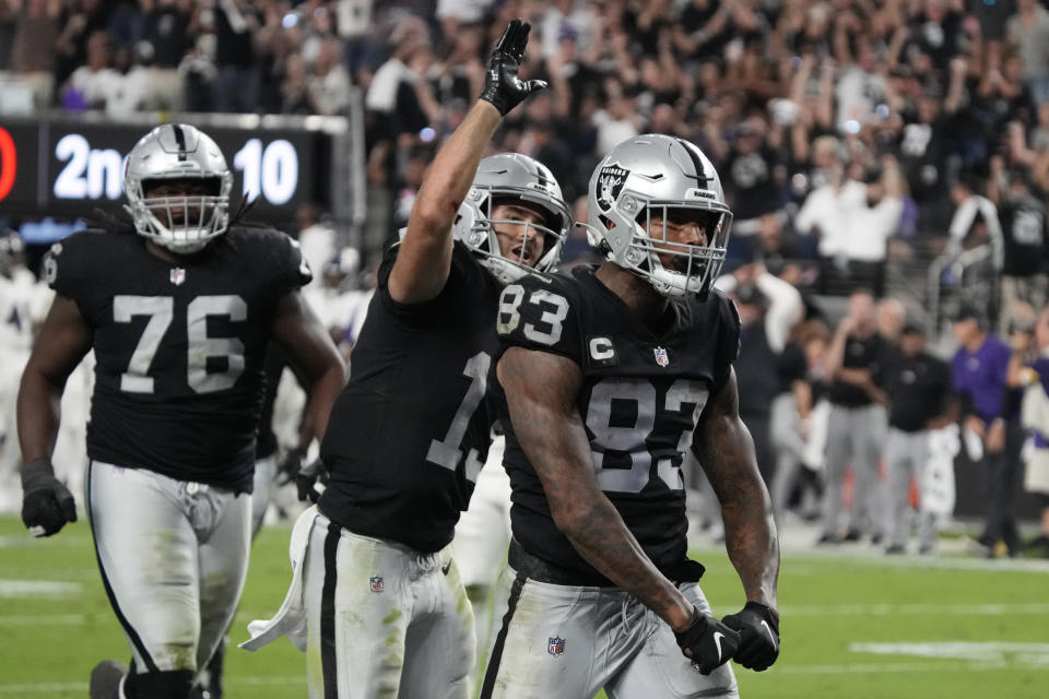 Las Vegas Raiders tight end Darren Waller (83) celebrates after scoring a touchdown against the Baltimore Ravens during the second half of an NFL football game, Monday, Sept. 13, 2021, in Las Vegas. (AP Photo/Rick Scuteri)