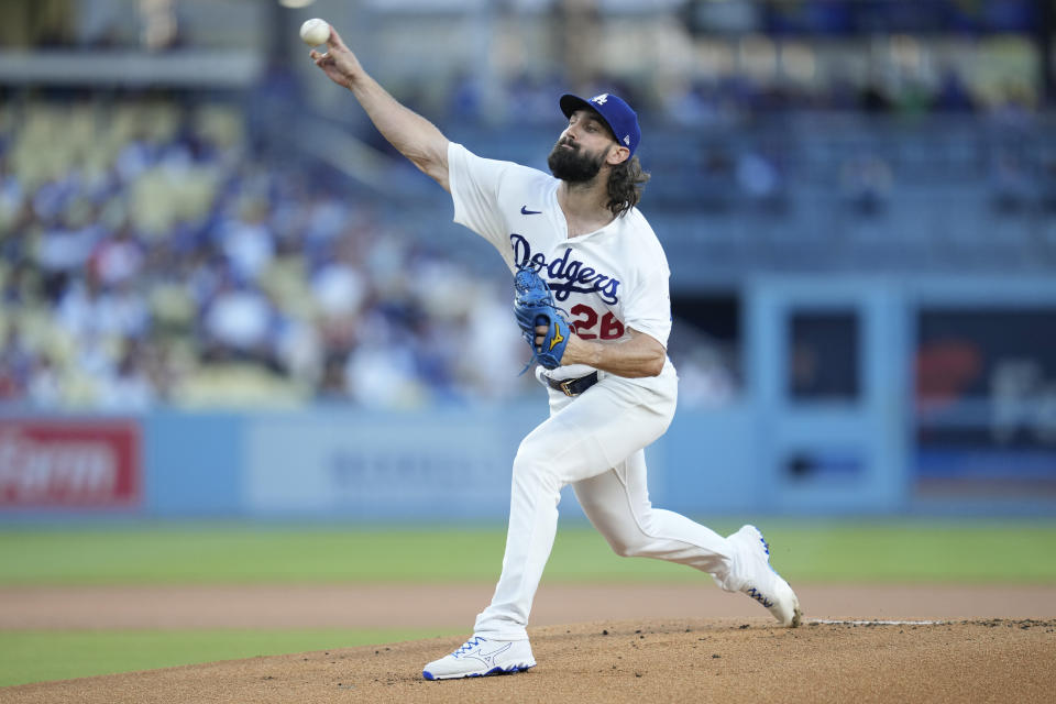Los Angeles Dodgers starting pitcher Tony Gonsolin (26) throws during the first inning of a baseball game against the Oakland Athletics in Los Angeles, Wednesday, Aug. 2, 2023. (AP Photo/Ashley Landis)