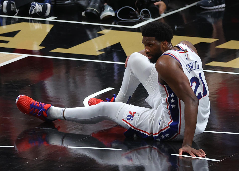 Philadelphia 76ers center Joel Embiid struggled to finish Game 4. (Kevin C. Cox/Getty Images)