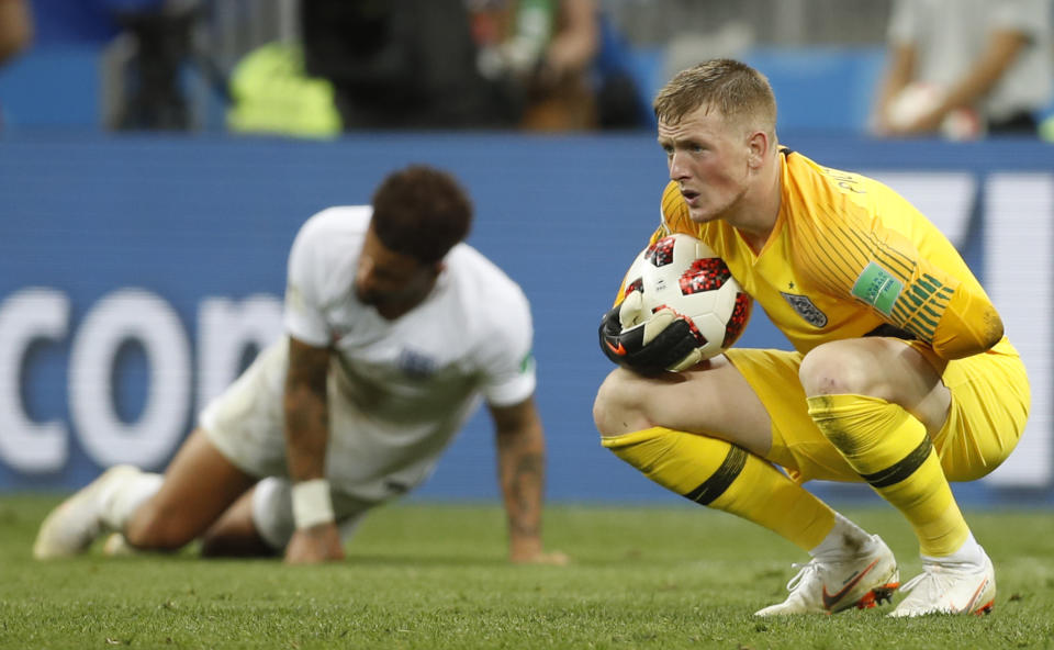 <p>Jordan Pickford holds the ball after failing to make a save against Ivan Perisic, luckily the follow up shot was tame </p>