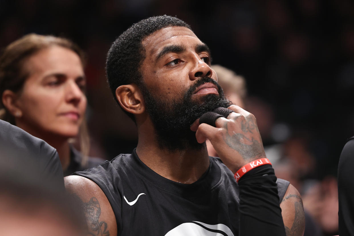 Kyrie Irving of the Brooklyn Nets looks on from the bench during a game against the Indiana Pacers at Barclays Center in New York City, on Oct.31, 2022. (Dustin Satloff/Getty Images)