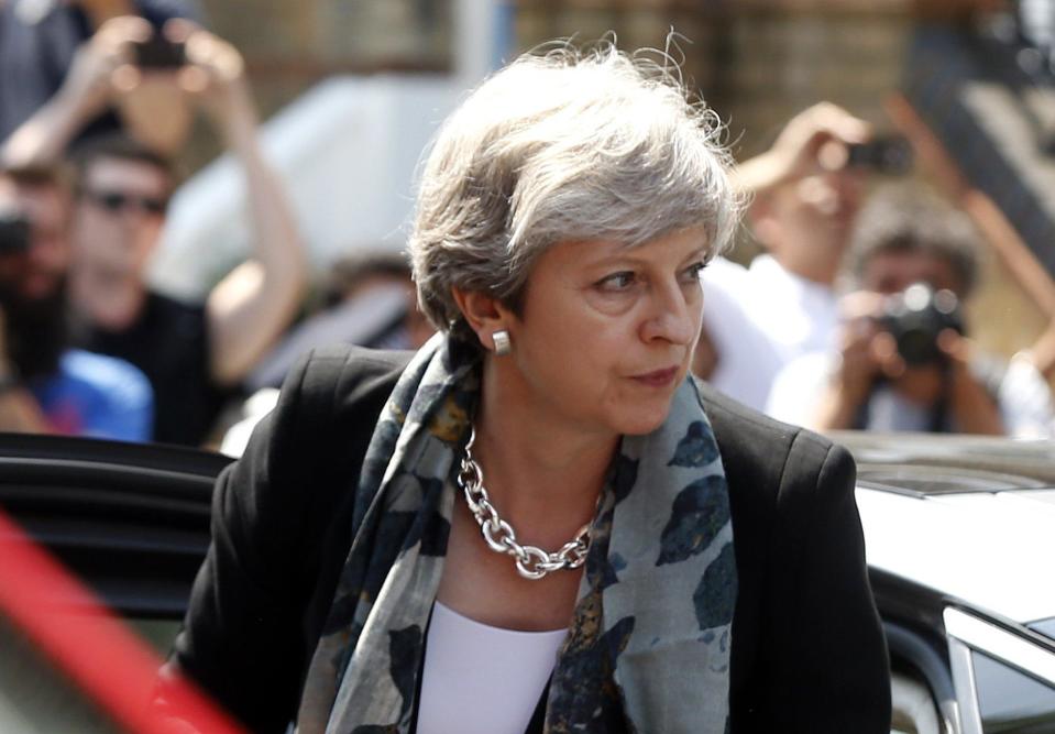 Theresa May arrives near the scene where a van struck pedestrians outside a mosque in Finsbury Park: AP