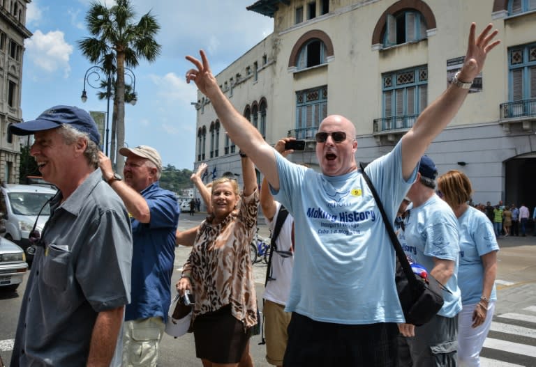 Passengers of the first US-to-Cuba cruise ship to arrive in the island nation in decades, walk in the streets of Havana right after disembarking on May 2, 2016