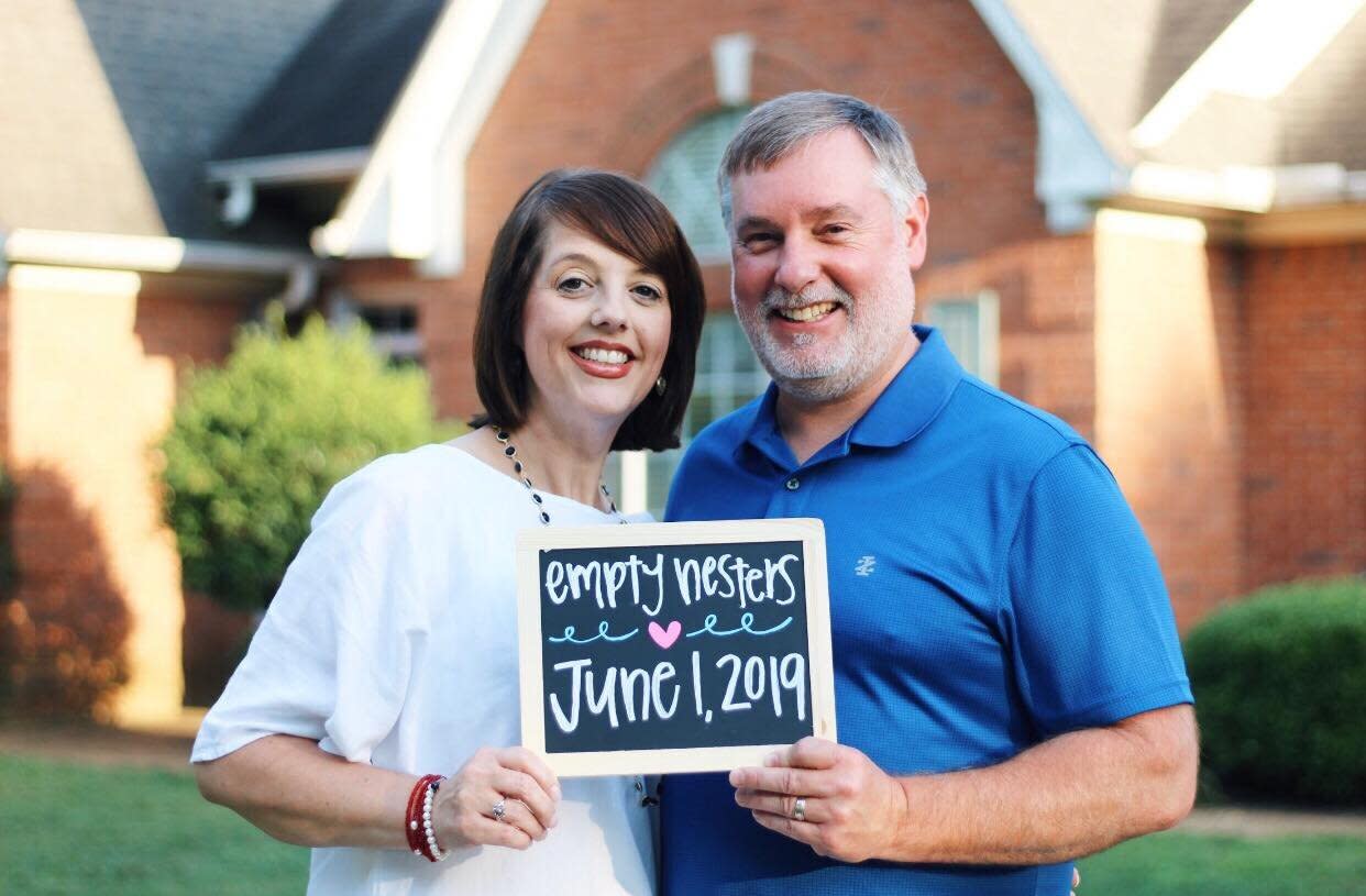 These parents from Mississippi are celebrating their latest milestone of becoming empty nesters. (Photo: Haley Marie Photography)