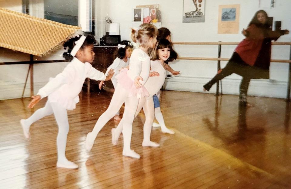 Sarah Taylor, left, practices in her first dance class through Southold Dance Theater in South Bend, where, as an adult, she is now its executive director.