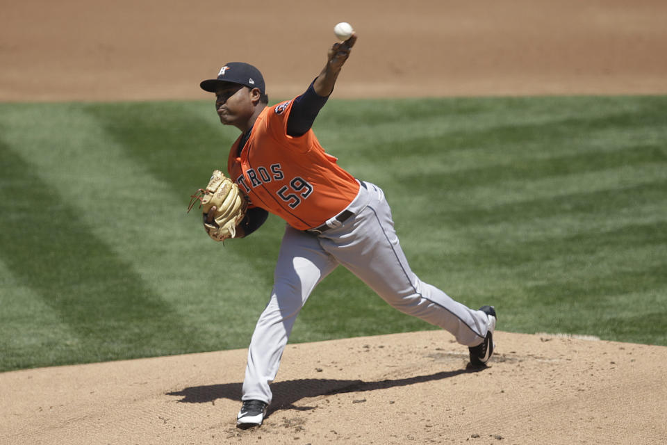 Houston Astros pitcher Framber Valdez works against the Oakland Athletics in the first inning of a baseball game Saturday, Aug. 8, 2020, in Oakland, Calif. (AP Photo/Ben Margot)