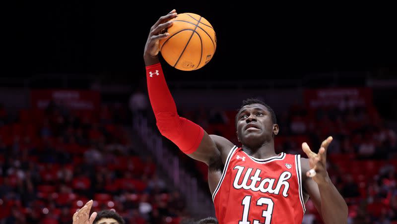 Utah Utes center Keba Keita (13) grabs a rebound as Utah and Colorado play in the Huntsman Center in Salt Lake City on Saturday, Feb. 11, 2023.