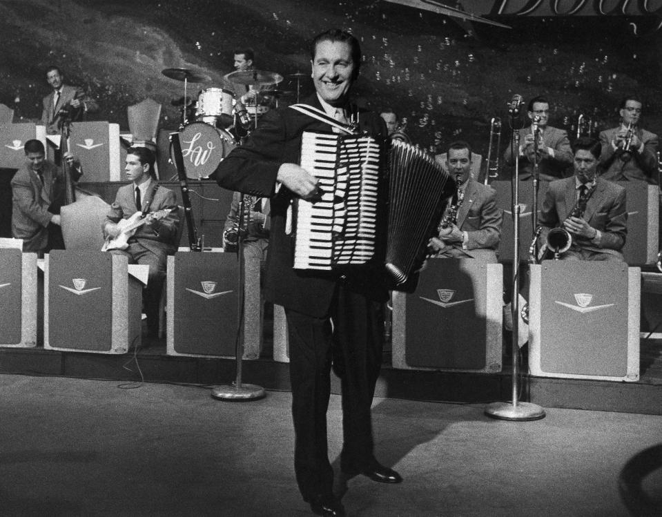 FILE - In this undated 1958 file photo Lawrence Welk leads his big band. The State Historical Society of North Dakota is considering buying Welk's boyhood home near the south-central North Dakota town of Strasburg to be used as a tourist destination to tout the importance of agriculture and the region's German-Russian heritage. (AP Photo/File)