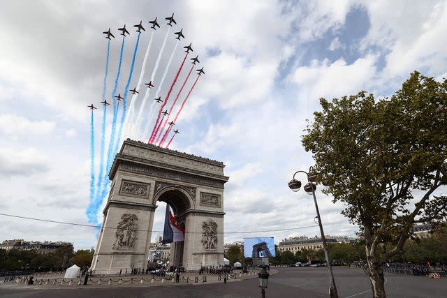 <p>THOMAS SAMSON/AFP via Getty Images</p> Official welcoming ceremony for King Charles and Queen Camilla at at the Arc de Triomphe in Paris on September 20, 2023