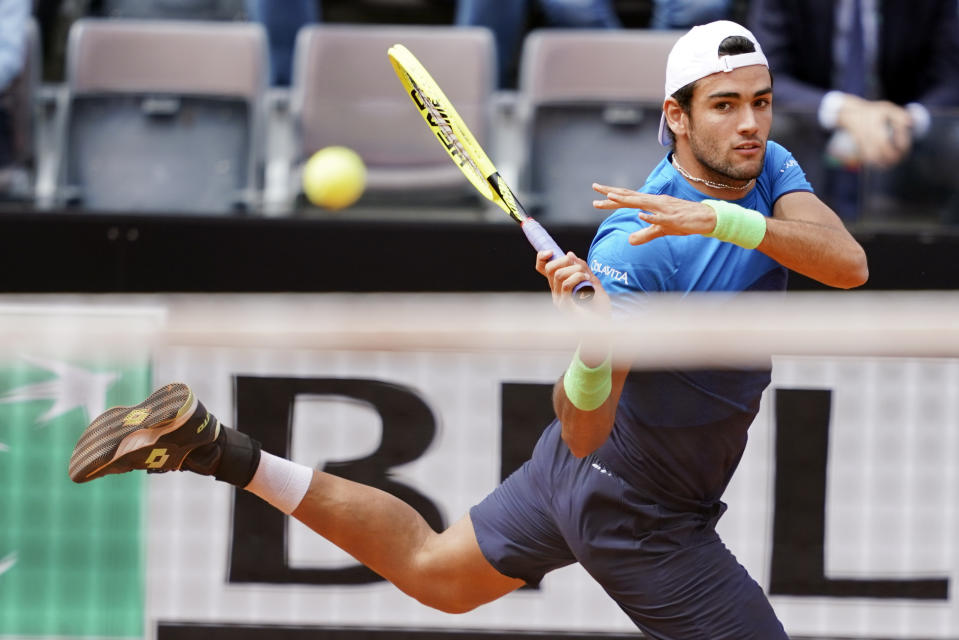 Matteo Berrettini, of Italy, returns the ball to Alexander Zverev, of Germany, at the Italian Open tennis tournament, in Rome, Tuesday, May, 14, 2019. (AP Photo/Andrew Medichini)