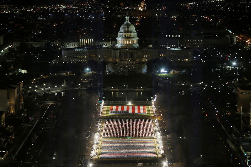 The "Field of Flags" is illuminated on the National Mall, in Washington