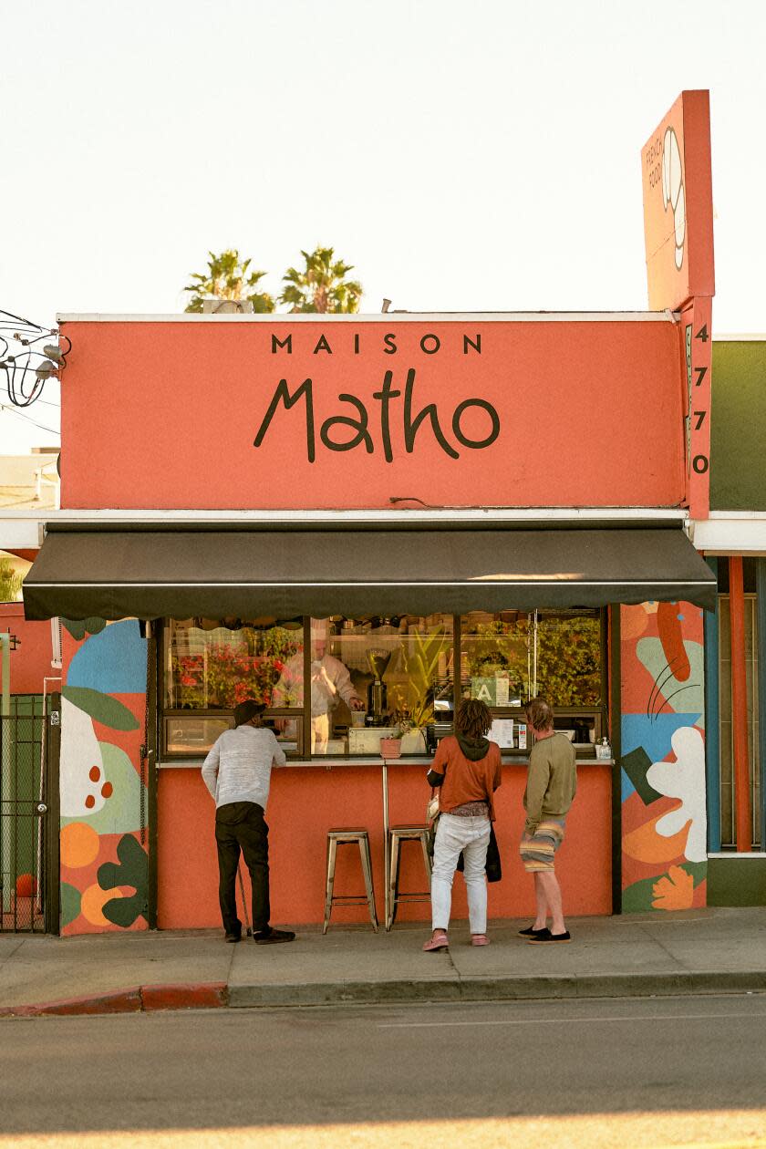 People at the walkup window at Maison Matho.