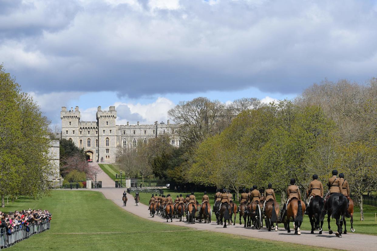 TOPSHOT - Members of the Kings Troop Royal Horse Artillery ride their horses into the grounds of Windsor Castle in Windsor, west of London, on April 15, 2021, following the April 9 death of Britain's Prince Philip, Duke of Edinburgh, at the age of 99. - Prince Philip's funeral will take place at St George's Chapel, Windsor Castle on Saturday, April 17. (Photo by JUSTIN TALLIS / AFP) / The erroneous mention[s] appearing in the metadata of this photo by JUSTIN TALLIS has been modified in AFP systems in the following manner: [Members of the Kings Troop Royal Horse Artillery] instead of [Members of the Household Cavalry Mounted Regiment]. Please immediately remove the erroneous mention[s] from all your online services and delete it (them) from your servers. If you have been authorized by AFP to distribute it (them) to third parties, please ensure that the same actions are carried out by them. Failure to promptly comply with these instructions will entail liability on your part for any continued or post notification usage. Therefore we thank you very much for all your attention and prompt action. We are sorry for the inconvenience this notification may cause and remain at your disposal for any further information you may require. (Photo by JUSTIN TALLIS/AFP via Getty Images)