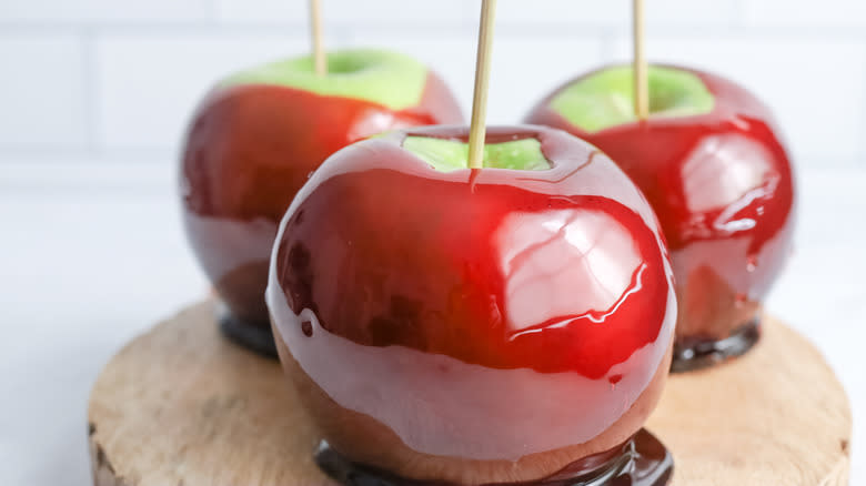 three candy apples