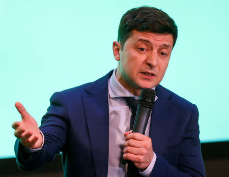 FILE PHOTO: Comic actor and presidential candidate Volodymyr Zelenskiy speaks following the announcement of the first exit poll in Ukraine's presidential election at his campaign headquarters in Kiev, Ukraine March 31, 2019. REUTERS/Valentyn Ogirenko/File Photo