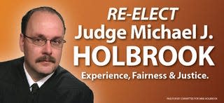 Judge Holbrook's current billboard design, which is similar to a billboard by Seventh Son Brewing.