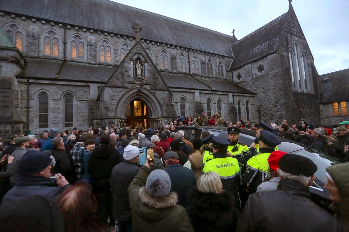 Huge crowds gathered at the church in Nenagh (EPA)