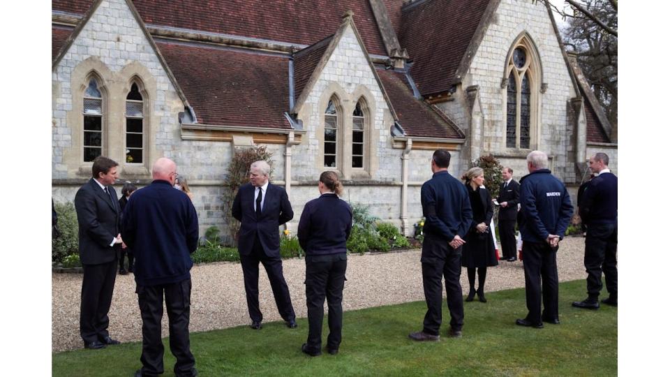 Prince Andrew and Duchess Sophie talk with Crown Estate staff as they attend the Sunday service at the Royal Chapel of All Saints