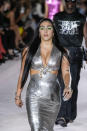 Lourdes Leon wears a creation for the Versace Spring Summer 2022 collection during Milan Fashion Week, in Milan, Italy, Friday, Sept. 24, 2021. (AP Photo/Luca Bruno)